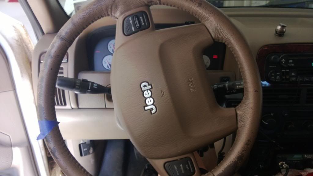 Steering wheel extremely crooked when going straight!! Jeep